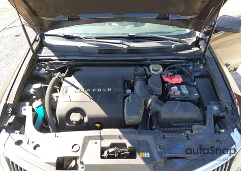 2013 Lincoln Mks from USA, damaged, VIN 1LNHL9DK5DG618563